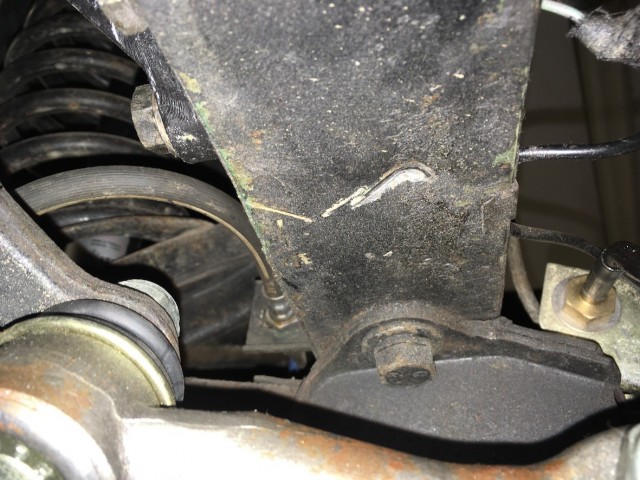 Lenkgetriebehebel Anschlag am Rahmen.jpg